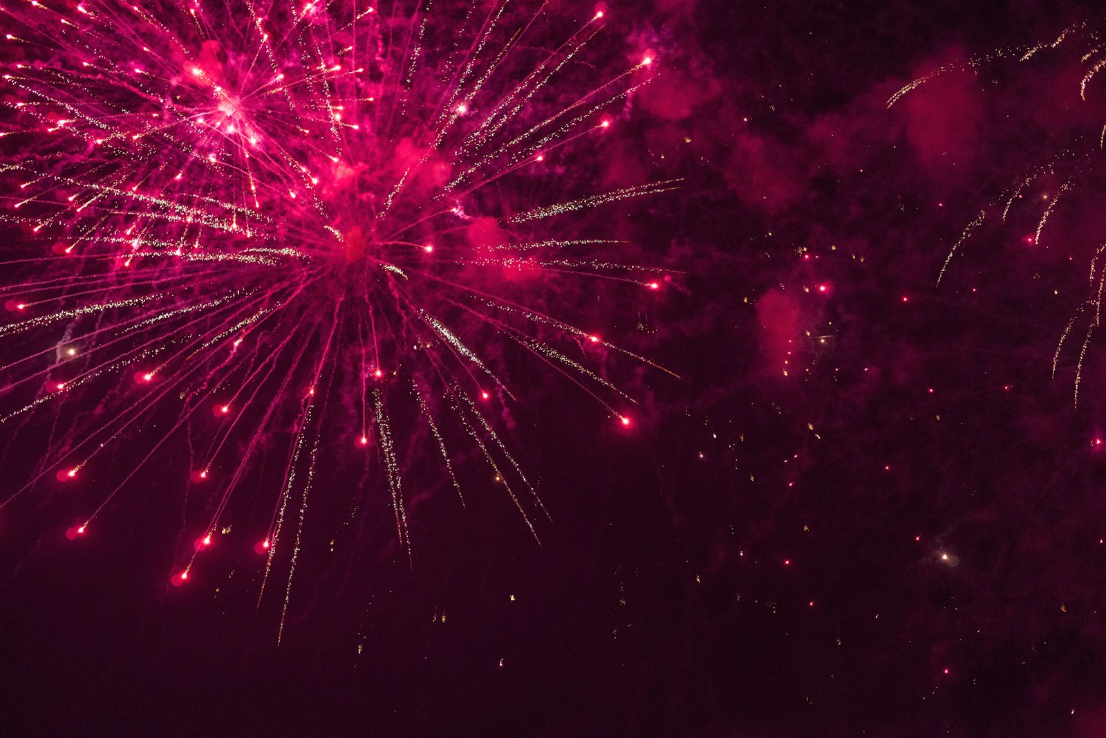 a large fireworks display in the night sky